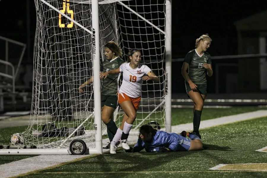 High school soccer player celebrating a goal