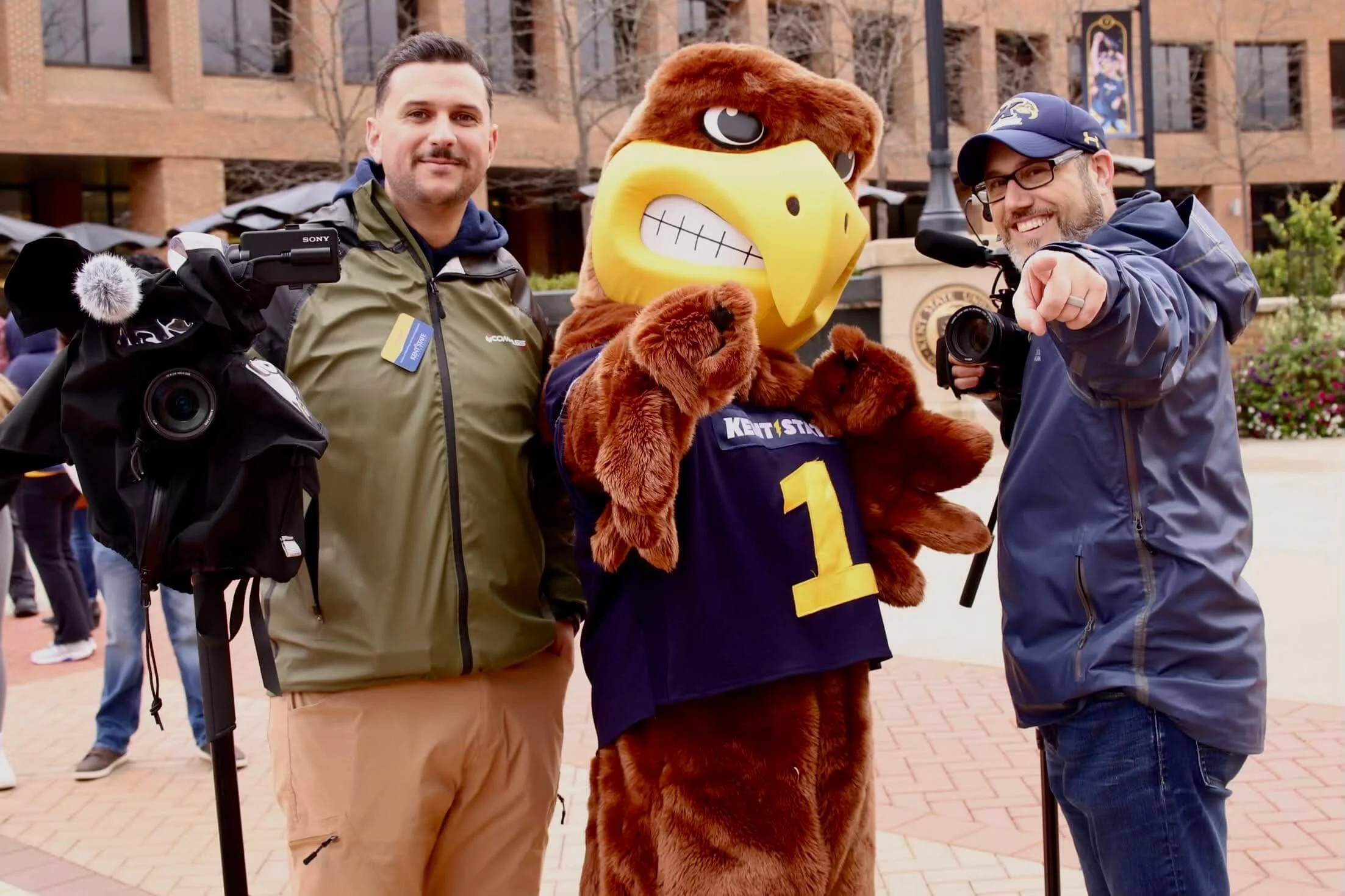 Jeff Alberini filming Kent State homecoming with Flash the mascot