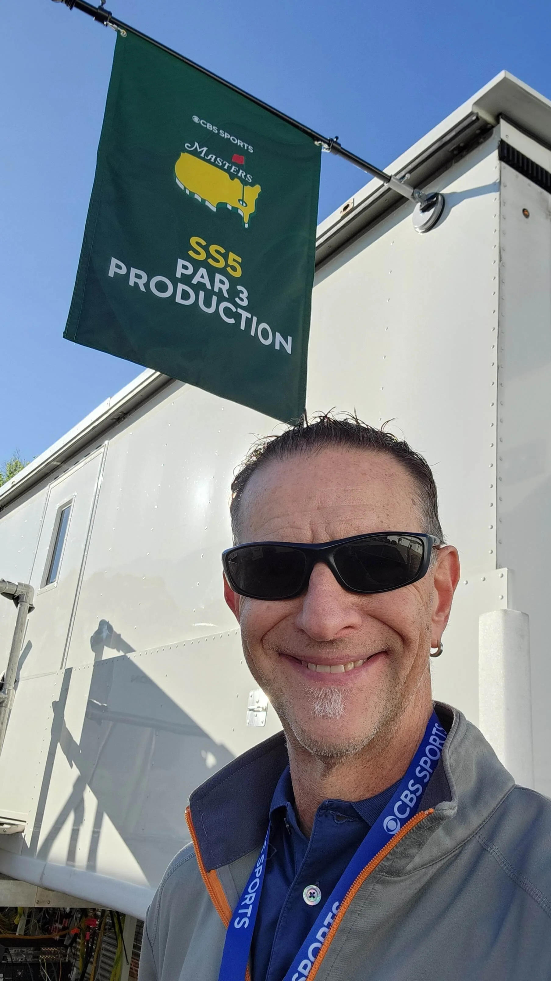 Mark Pokedoff outside The Masters TV truck